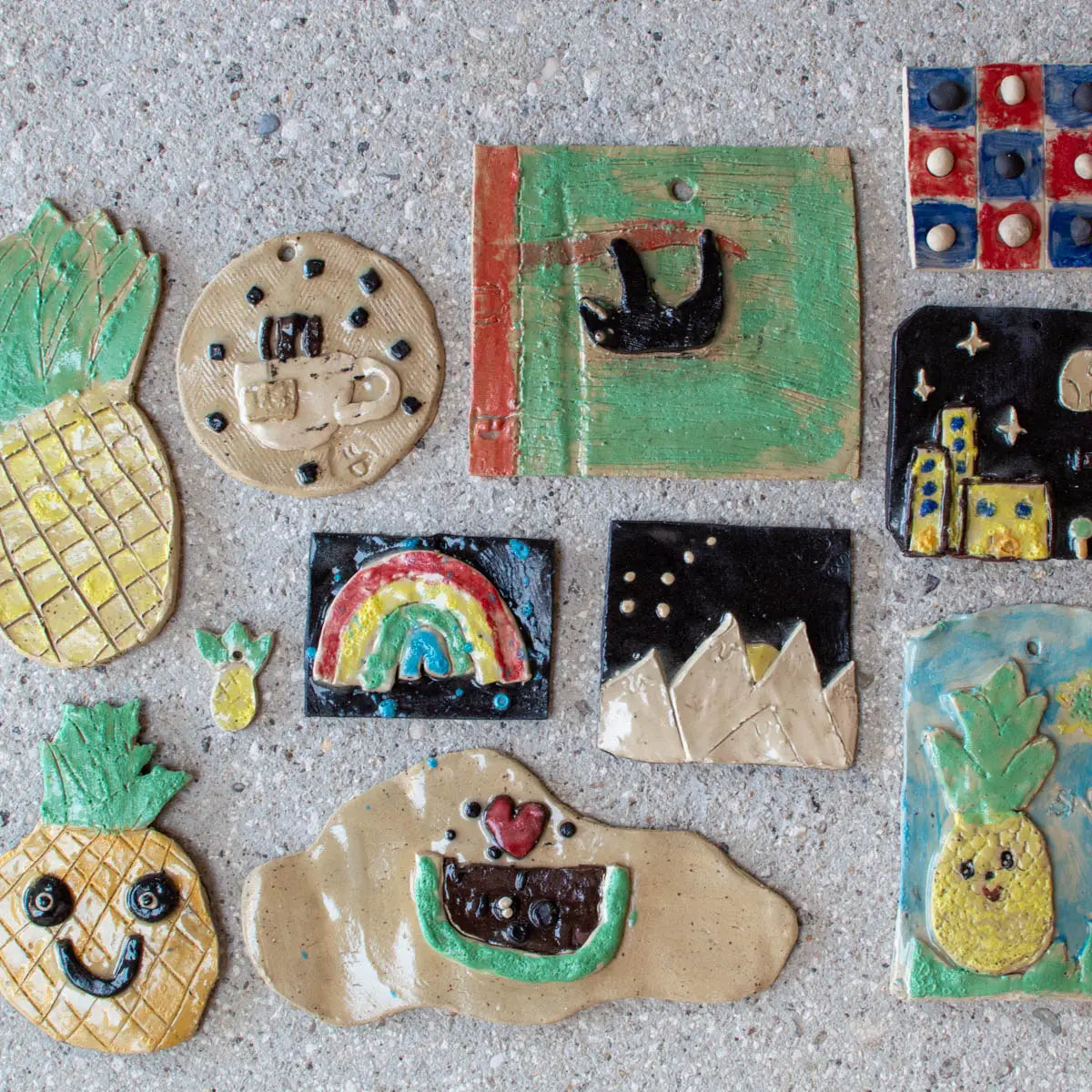 Colorful handmade ceramic tiles by Urchic Porcelain inspire creativity—a perfect match for GLINARIJE NA LONTRGU: Poletna mala šola gline za otroke - AKONTACIJA, a summer clay workshop designed to boost kids’ creative skills.